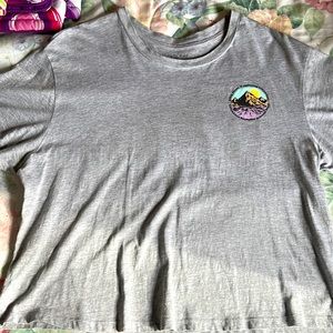 Brand is Pretty Rebel. Size is Large. Nice graphic cropped shirt.